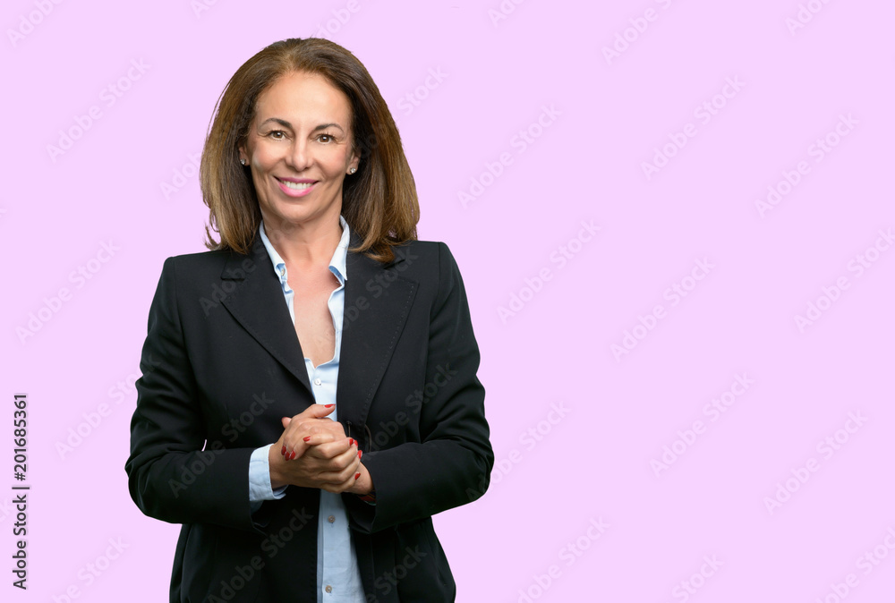 Middle age business woman confident and happy with a big natural smile laughing Middle age business woman confident and happy with a big natural smile laughing