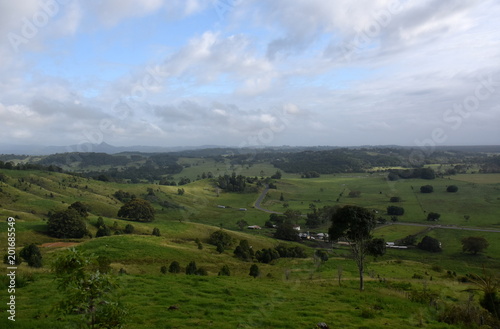 Broad panorama of the countryside in North New South Wales with green fields. Grassy hills in Australia. View from Minyon Falls lookout  Nightcap National Park.