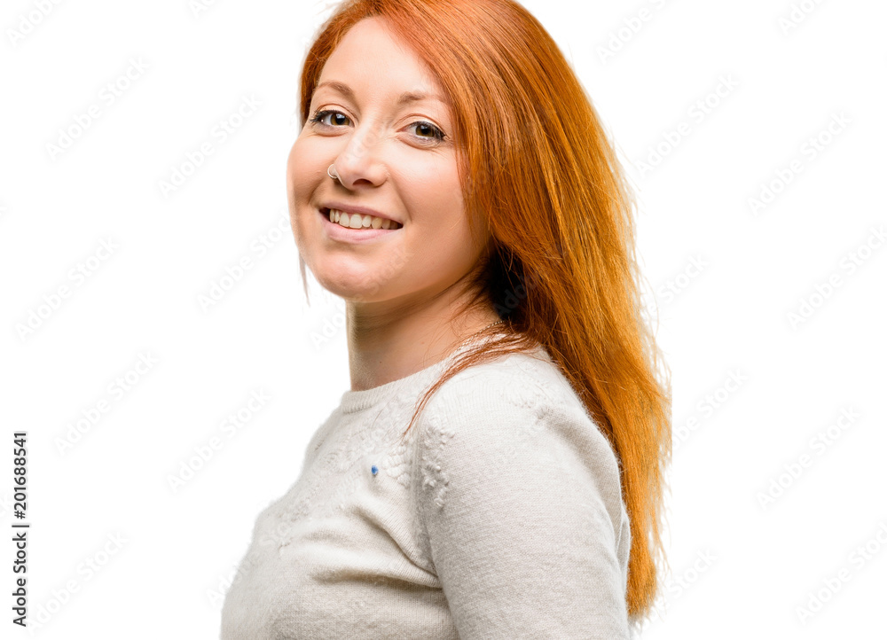 Beautiful young redhead woman confident and happy with a big natural smile laughing isolated over white background Beautiful young redhead woman confident and happy with a big natural smile laughing isolated over white background