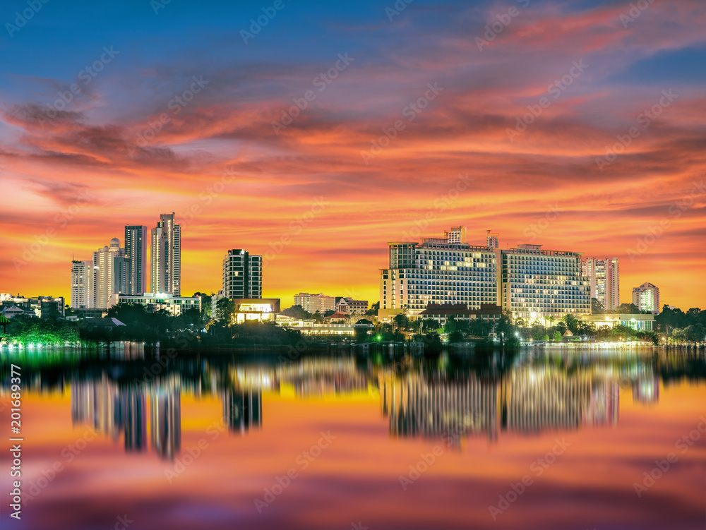 view of Pattaya City in night light, famous tourist place and source of entertainment for relaxation in Holiday and vacation