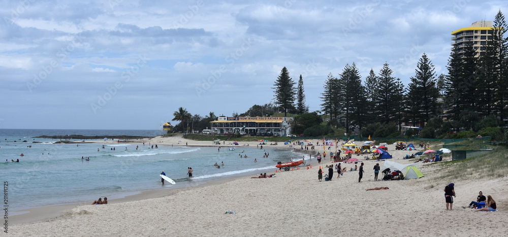 Fototapeta premium Coolangatta, Australia - Dec 26, 2017. People relaxing and sunbathing on Rainbow Beach.