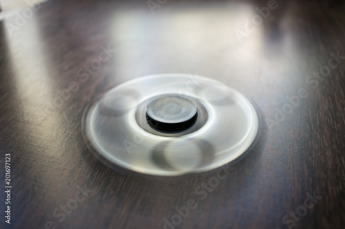 Photo of a black spinner.