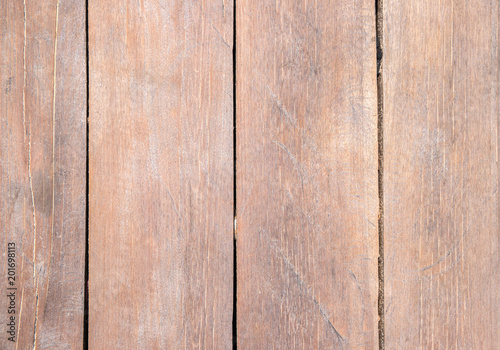 Pale brown wooden texture. Timber board top view photo background. Rustic wood backdrop.