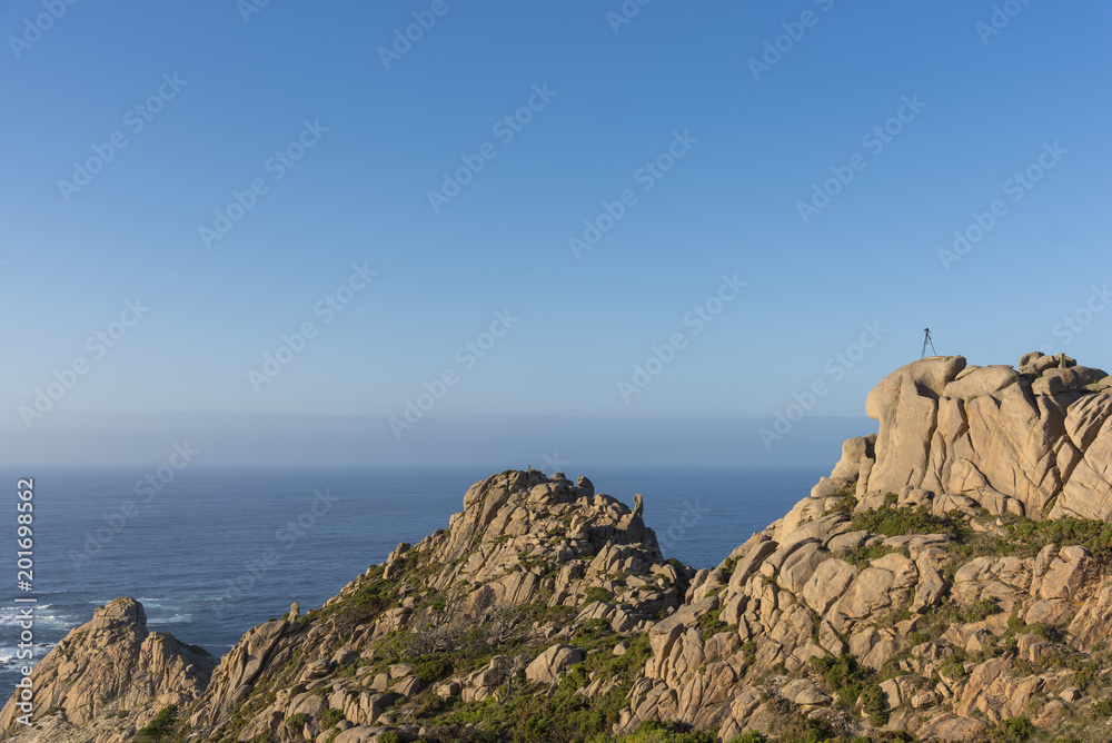 Photo camera in a tripod in Camarinas coast (La Coruna, Spain).