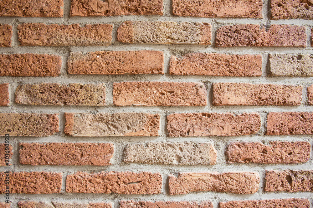Fototapeta premium Traditional orange brick tiles wall background texture