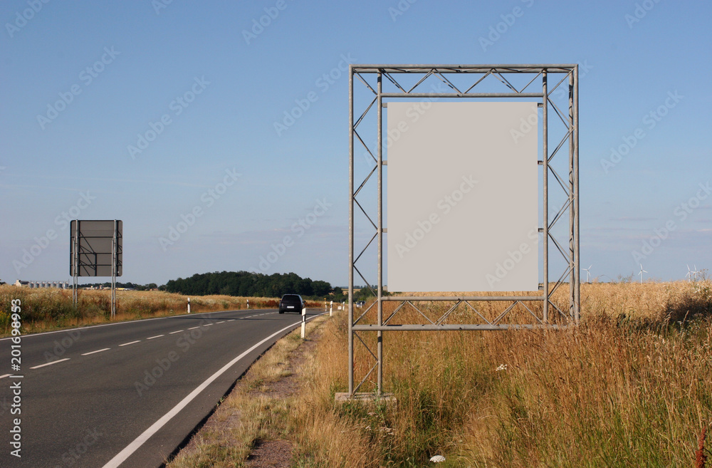 Advertising: Not to be overlooked billboard on the edge of a federal road in Germany Advertising: Not to be overlooked billboard on the edge of a federal road in Germany