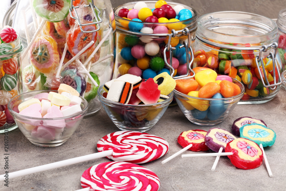 candies with jelly and sugar. colorful array of different childs sweets and treats. candies with jelly and sugar. colorful array of different childs sweets and treats.