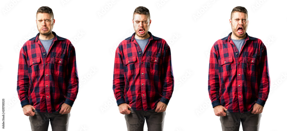 Young man crying depressed full of sadness expressing sad emotion isolated over white background, collage composition