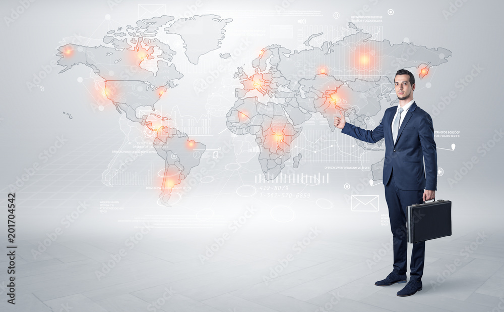Businessman in dark suit hitchhike to business trip in a front of a map with destination Businessman in dark suit hitchhike to business trip in a front of a map with destination