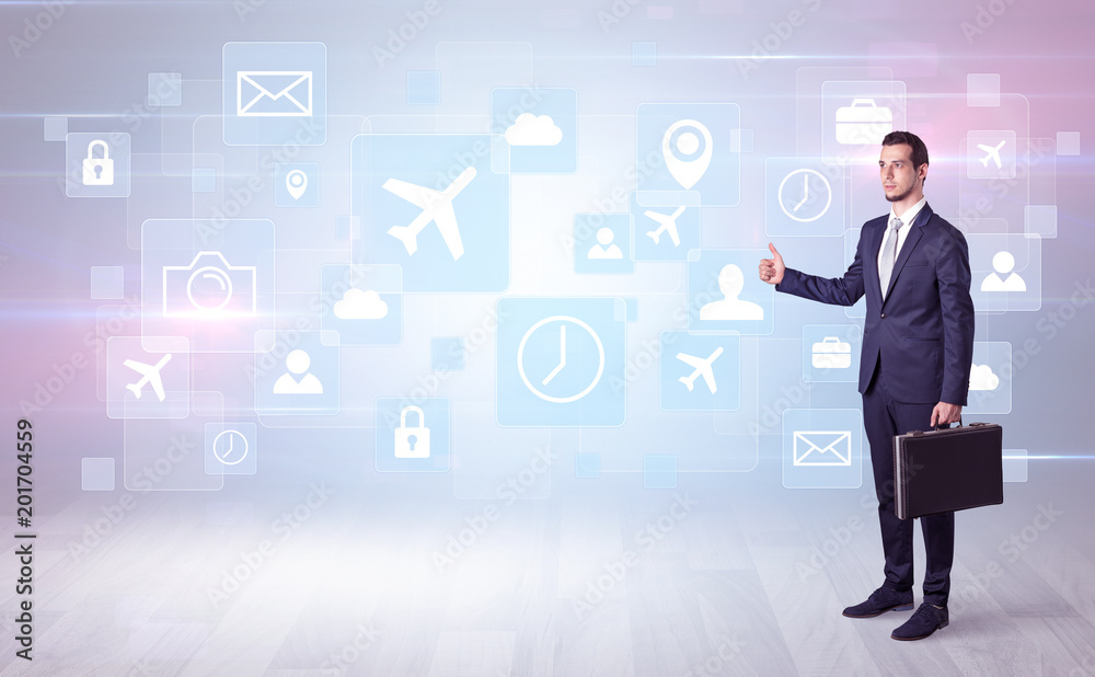 Businessman departs to a business trip with social media and travel symbol concept
Businessman departs to a business trip with social media and travel symbol concept