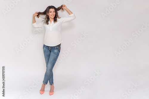 beautiful  girl on a white background in different poses