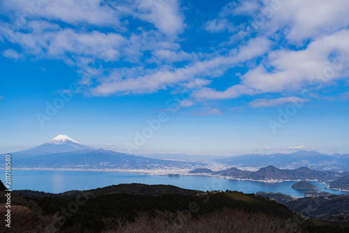 Hazy Mt. Fuji with Suruga bay from Darumayama of Izu peninsula in Japan at Spring. 