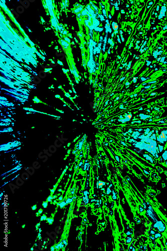Creative abstract background reminding of a burst full of dynamics in blue, green, black ect.