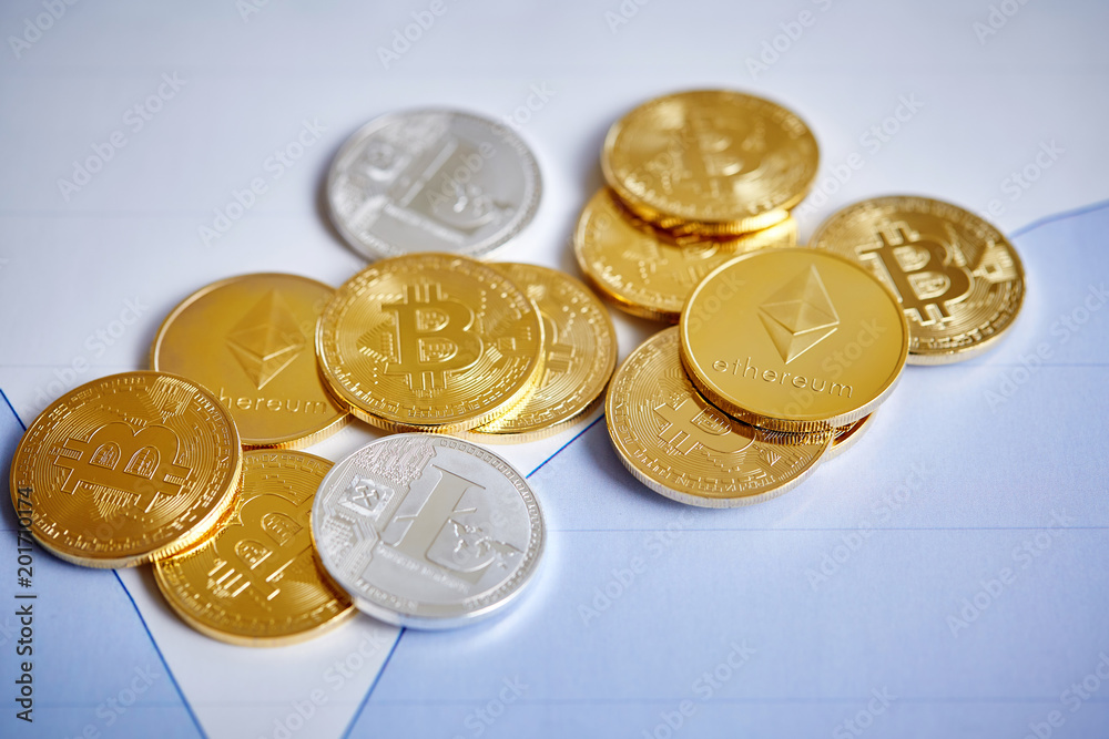 Bitcoin cryptocurrency on the chart background, close-up, shallow depth of field