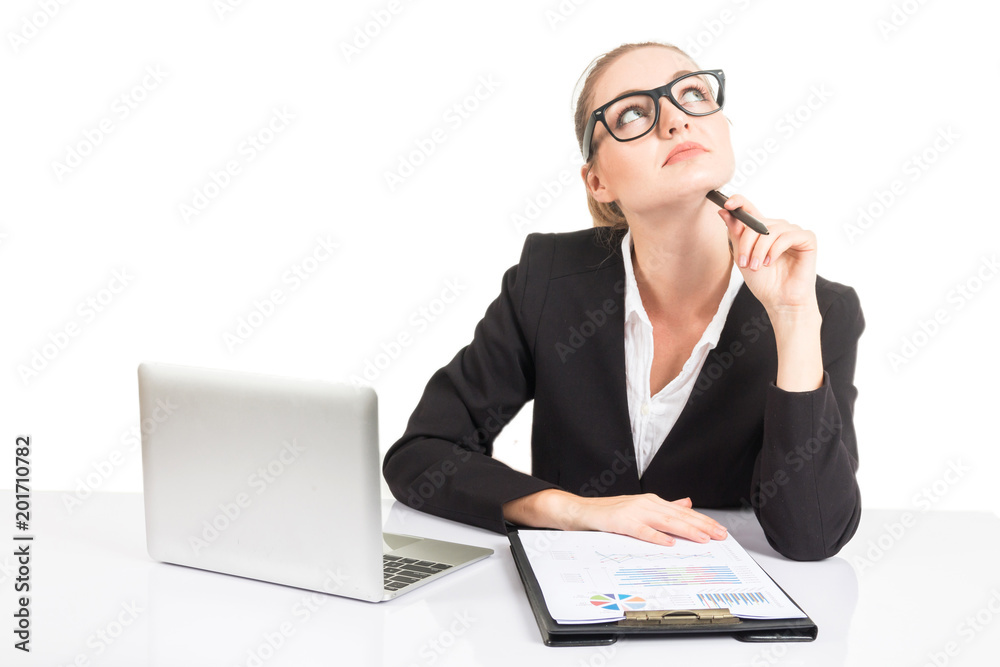 Business woman thinking and working on notebook computer and business document isolated on white background Business woman thinking and working on notebook computer and business document isolated on white background