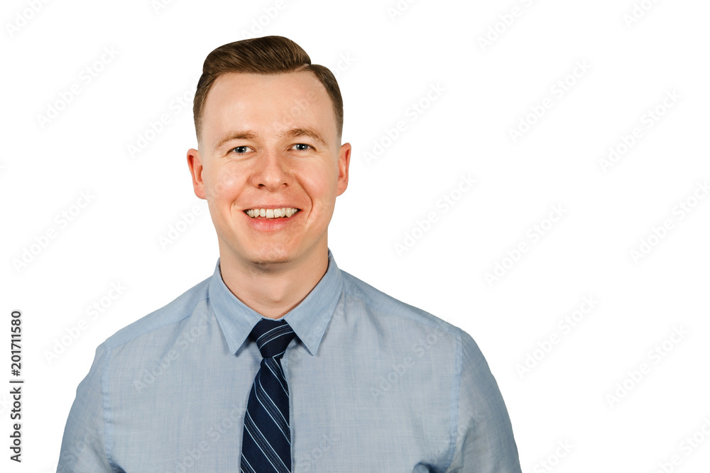 Portrait of young smiling businessman dressed in blue shirt and tie, isolated on white background Portrait of young smiling businessman dressed in blue shirt and tie, isolated on white background