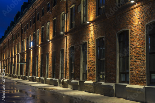Old brick house. Night view in the old industrial quarter. Moscow. Hamburg. © Valery