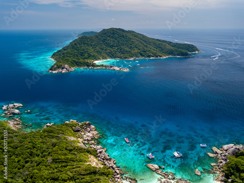 Aerial view of beautiful jungle covered tropical islands with coral reefs (Similan Islands, Thailand)