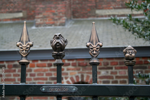 Church fence with funny heads