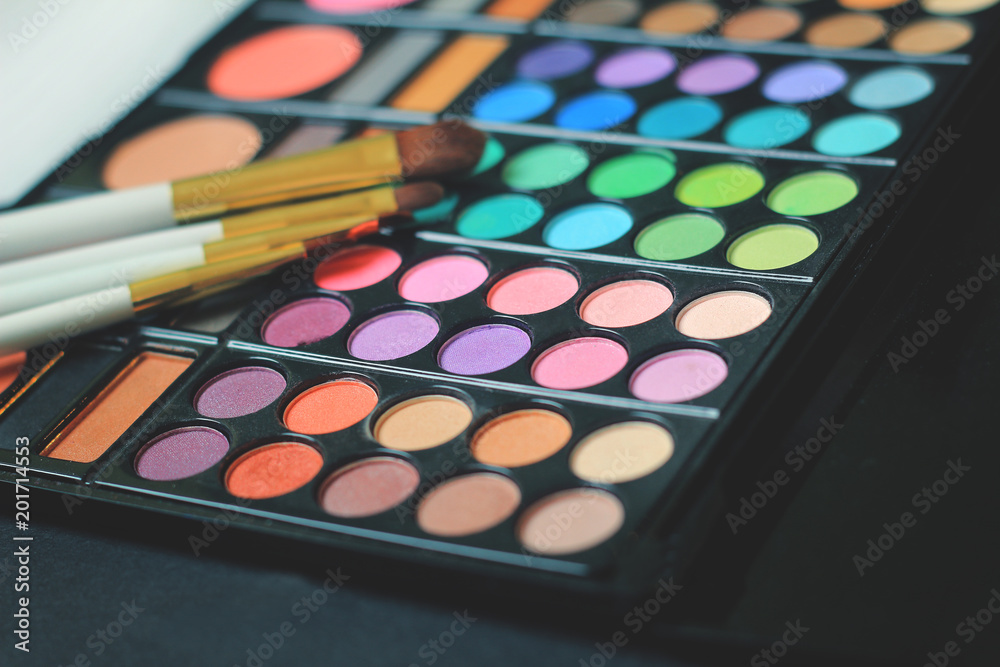 close up. makeup brushes lie on the cosmetic set close up. makeup brushes lie on the cosmetic set
