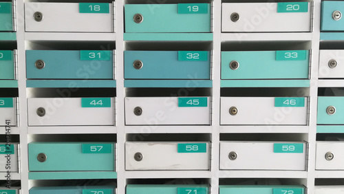 white green mailboxs locker postal in condominium