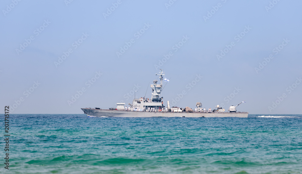 A combat ship is participating in a maritime parade off the coast of Haifa in honor of the 70th anniversary of the independence of the State of Israel