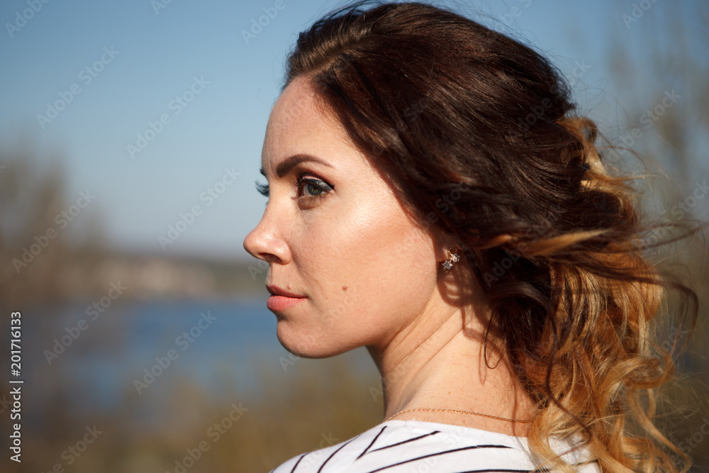 girl with long hair sunny portrait