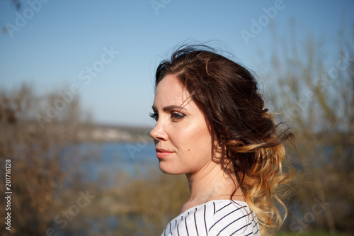 girl with long hair sunny portrait