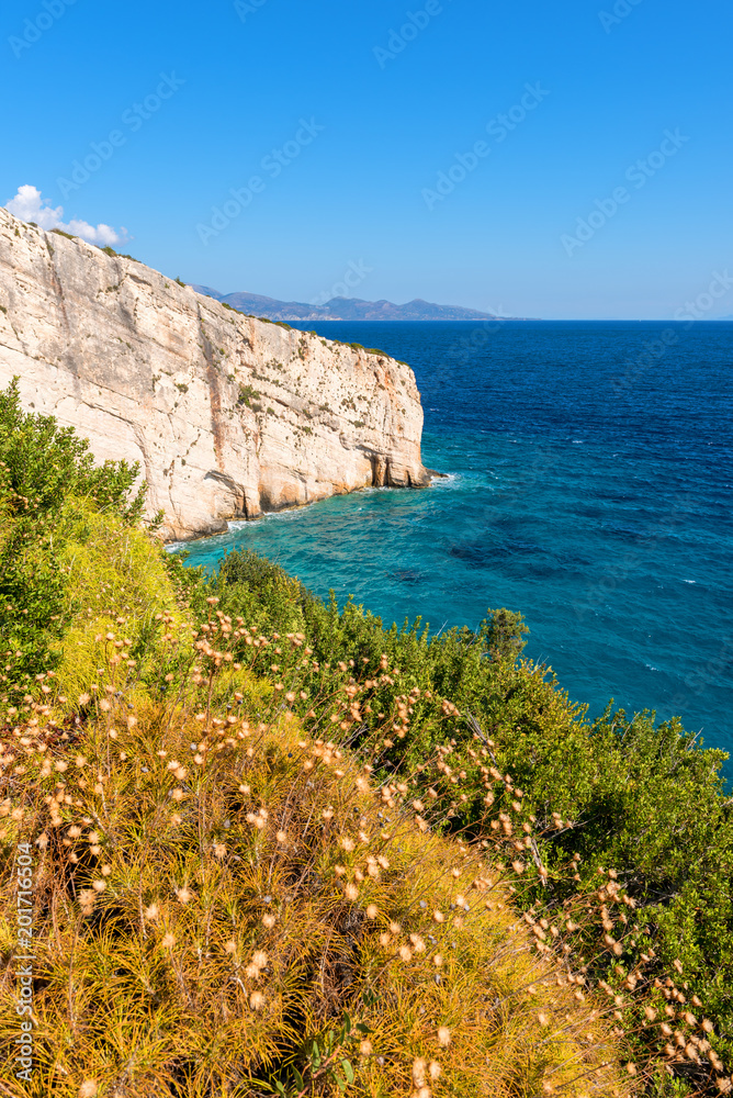 Summer landscape, cliff and blue sea near Skinari cape on Zakynthos island. Greece.