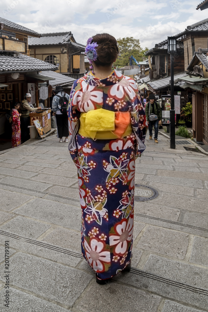 Geisha in an alley in the historic center of Kyoto, Japan
