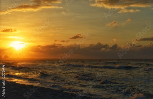 caribbean sea storm at sunset time