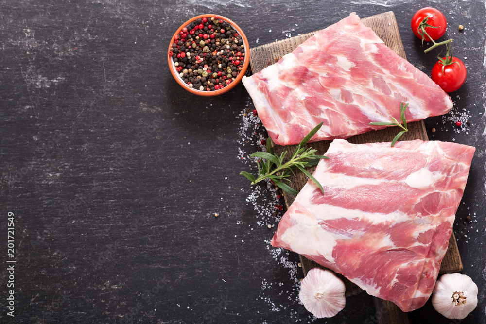 fresh pork ribs with ingredients for cooking