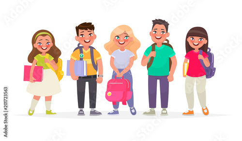 Group of happy pupils.Boys and girls with backpacks and books. Primary school children