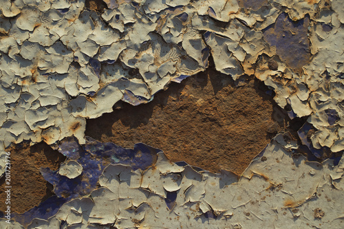 Corrosion of metal. Peeling paint from the iron surface.
