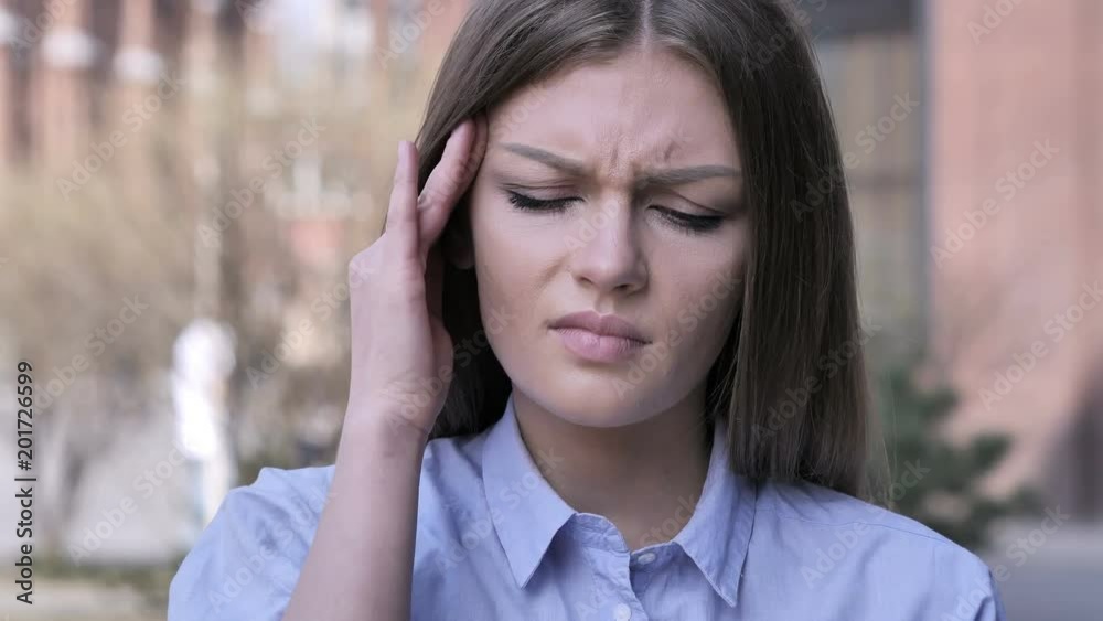 Headache, Portrait of Tense Woman in Office Headache, Portrait of Tense Woman in Office