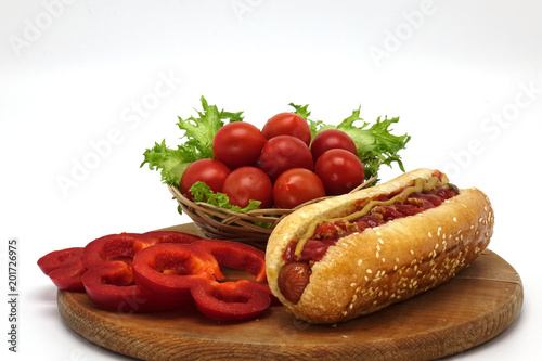 Hot dogs and French fries on white background.