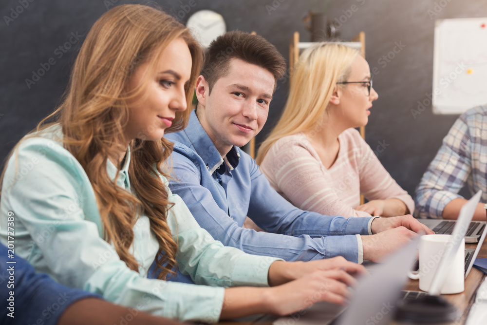 Programmers working in software developing company Programmers working in software developing company