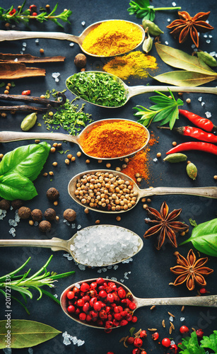 Fototapeta Naklejka Na Ścianę i Meble -  Various herbs and spices on dark background