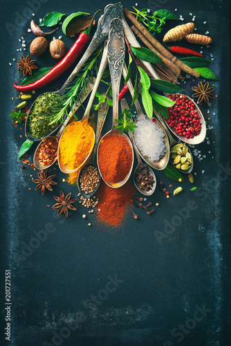 Fototapeta Naklejka Na Ścianę i Meble -  Various herbs and spices on dark background