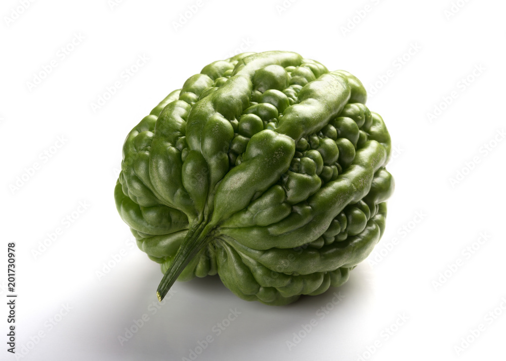 Obraz premium side view fresh green bitter melon on a white background