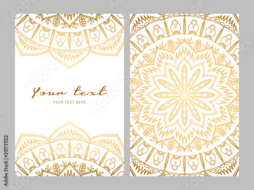 Greeting card golden ethnic patterns on white background