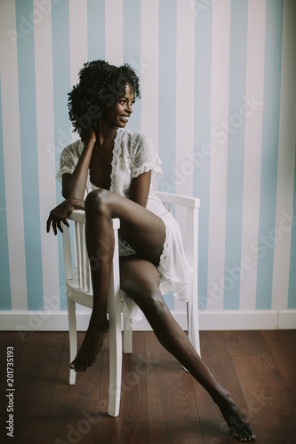 Young black woman in the white