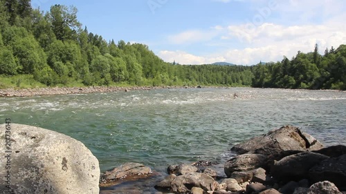 Rapid flow of the beautiful mountain river 