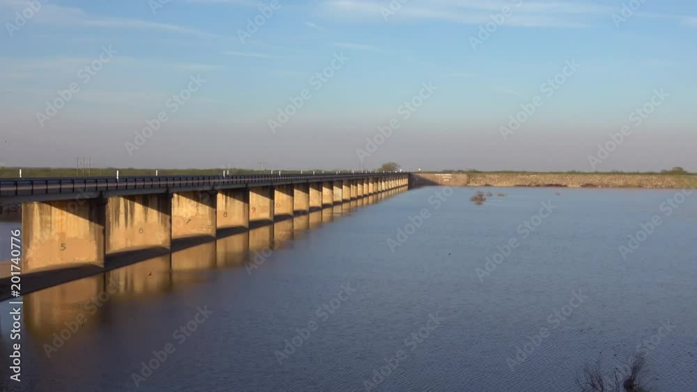 April, 2018. Panoramic view of part of Lake Arrowhead State Park and bridge over the lake at sunset. April, 2018. Panoramic view of part of Lake Arrowhead State Park and bridge over the lake at sunset.