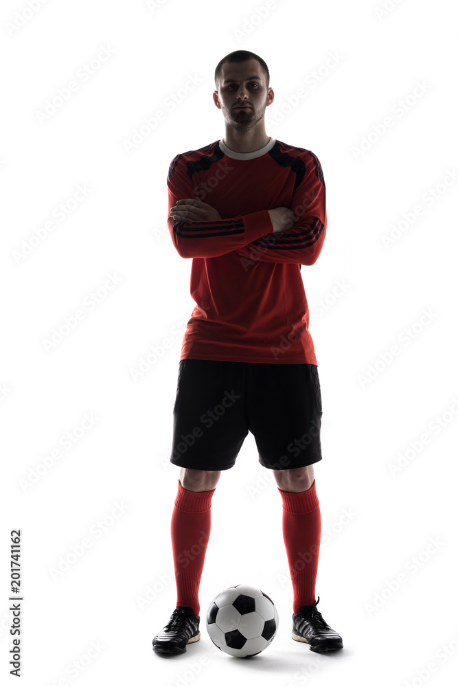 silhouette portrait of young player crossed hands with soccer ball isolated on white background silhouette portrait of young player crossed hands with soccer ball isolated on white background