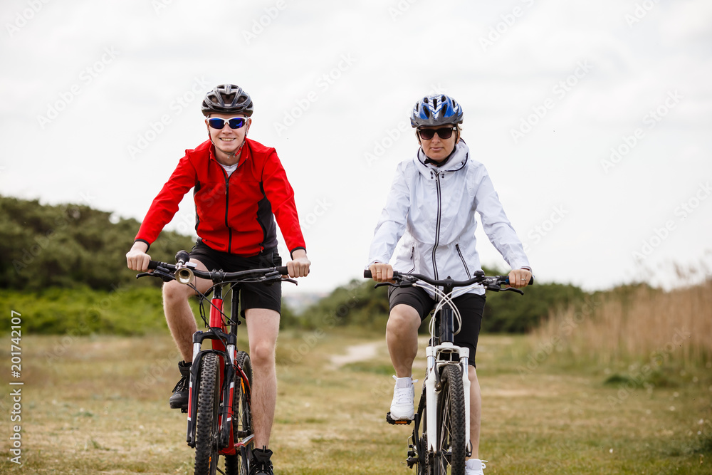 Healthy lifestyle - people riding bicycles Healthy lifestyle - people riding bicycles