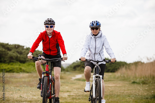 Healthy lifestyle - people riding bicycles