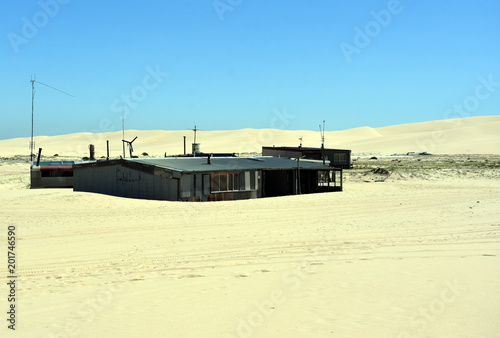 Tin City, Australia - March 30, 2017. In the 1930s a group of squatters constructed a series of tin shacks. Today, eleven of the shacks, known collectively as "Tin City", remain on Stockton Beach.