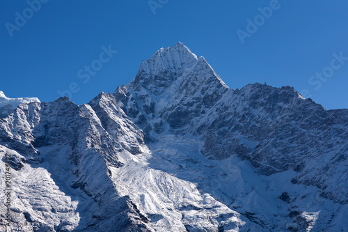 Thamserku mount in Sagarmatha National park, Nepal Himalayas © Zzvet