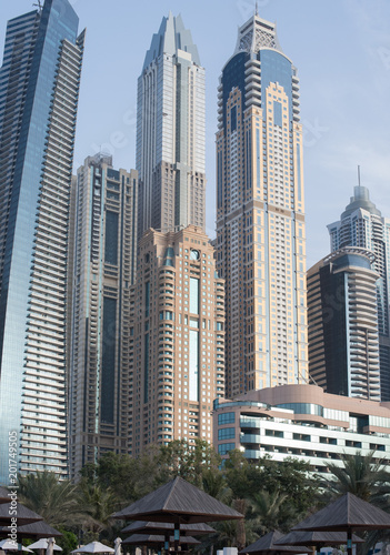 View of Dubai tall buildings from sea front